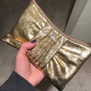 Gold Kate Spade clutch